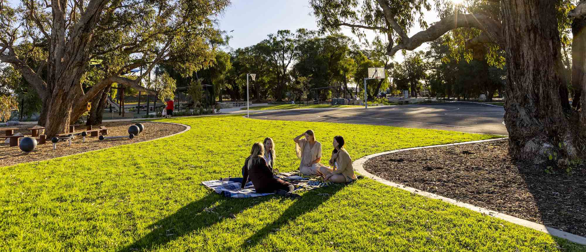 vasse estate girls sitting on grass land for sale all ages park